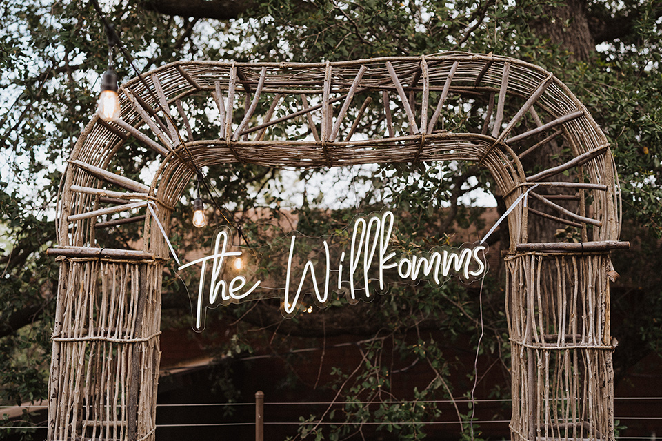 a neutral monochromatic earth toned wedding with boho trendy vibes - neon sign 