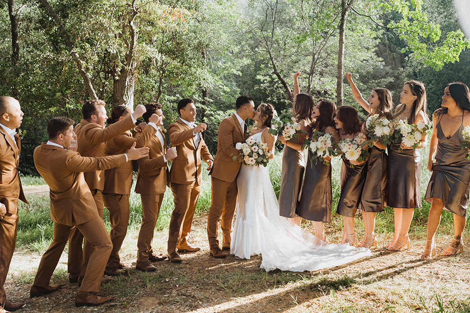  a neutral monochromatic earth toned wedding with boho trendy vibes - wedding party 