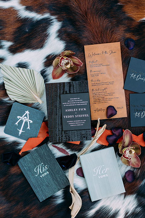 a moody western wedding with burgundy and orange colors - invitations 