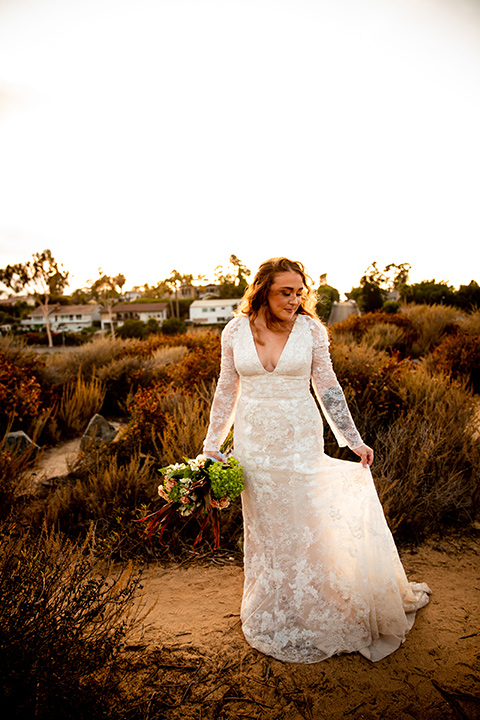 newport wedding in the cliffs with the bride in a lace gown and the groom in a navy blue suit – bride 