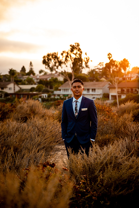  newport wedding in the cliffs with the bride in a lace gown and the groom in a navy blue suit – groom 