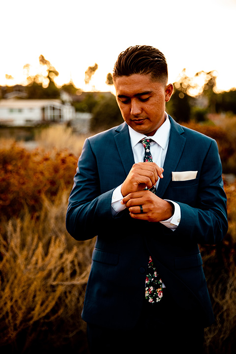  newport wedding in the cliffs with the bride in a lace gown and the groom in a navy blue suit – groom 