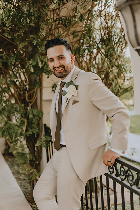  romantic neutral wedding with Spanish flare – groom