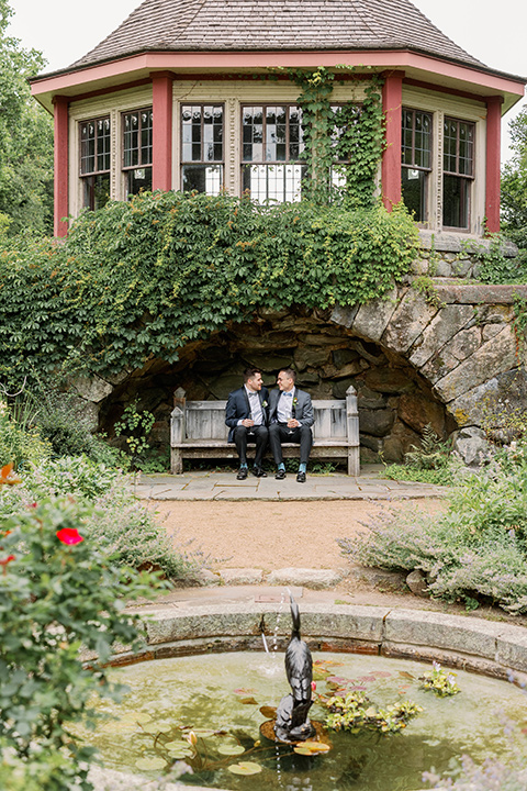  english garden wedding with blue and green touches – couple sitting on the bench 
