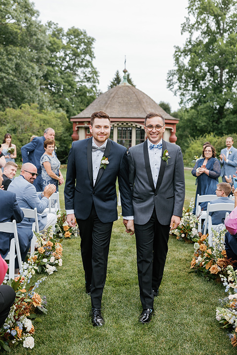  english garden wedding with blue and green touches – walking down the aisle