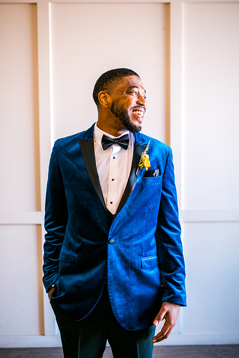  jewel toned wedding with the bride in a ballgown and the groom in a blue velvet tuxedo – groom 