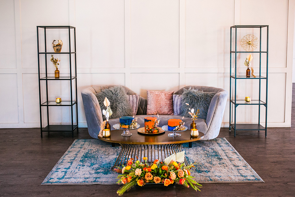  jewel toned wedding with the bride in a ballgown and the groom in a blue velvet tuxedo – reception decor