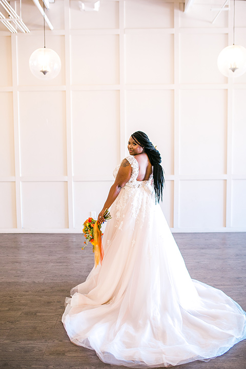  jewel toned wedding with the bride in a ballgown and the groom in a blue velvet tuxedo – bride