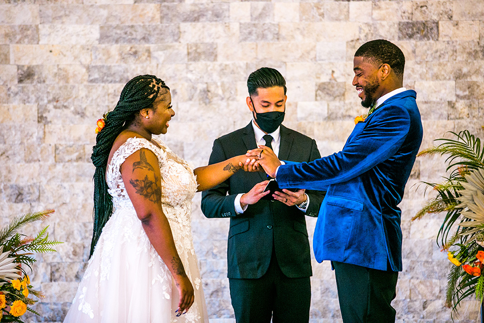  jewel toned wedding with the bride in a ballgown and the groom in a blue velvet tuxedo – vows