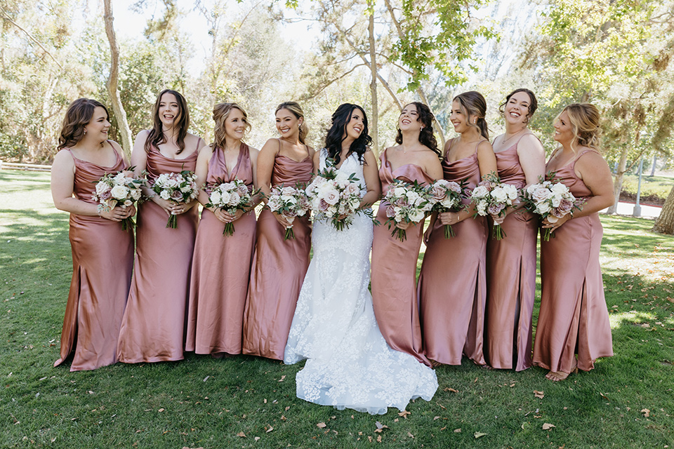  a classic blush and blue wedding design in a garden venue - bridesmaids 