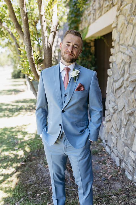  a classic blush and blue wedding design in a garden venue - groom 