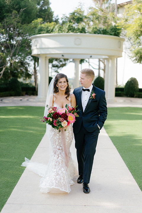  stephanie and blakes wedding at the waldorf with navy and blush décor – couple walking