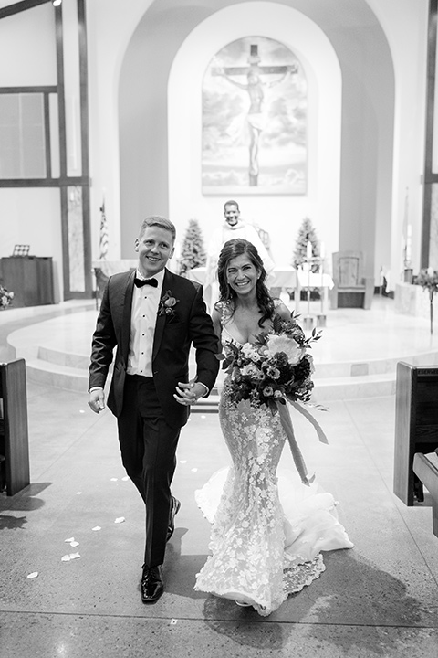  stephanie and blakes wedding at the waldorf with navy and blush décor – couple at ceremony 
