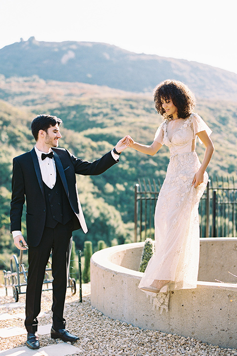  classic black tie wedding at the stone mountain estate – couple hugging 