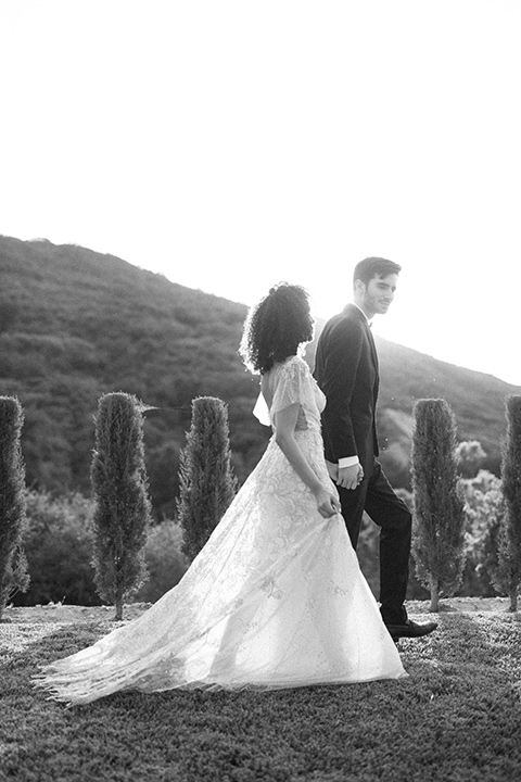  classic black tie wedding at the stone mountain estate – couple hugging 