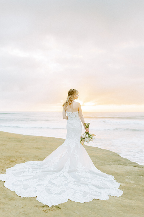  sunset cliffs elopement with confetti poppers and a chic picnic - bride