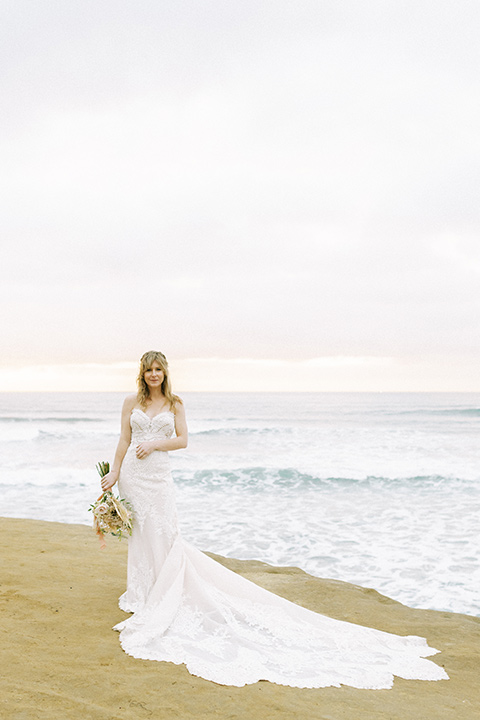  sunset cliffs elopement with confetti poppers and a chic picnic - bride 