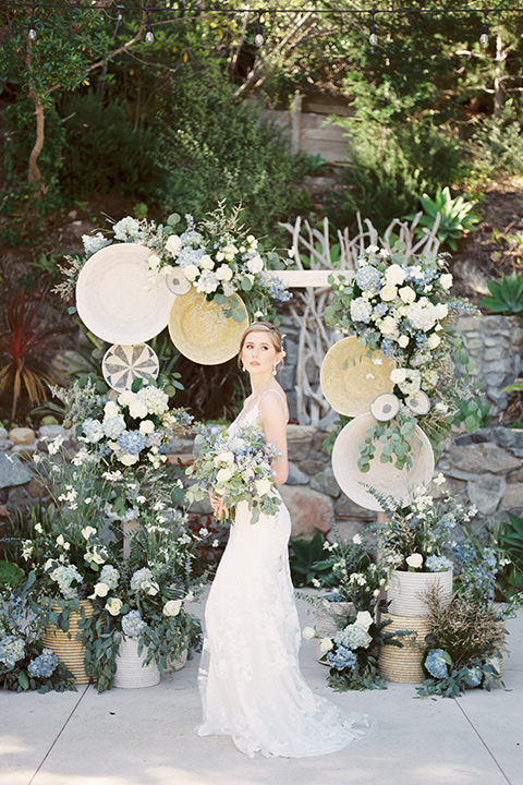  blue beachy wedding with blue and pink décor and the groom in a light blue suit – bride 