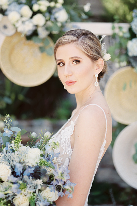  blue beachy wedding with blue and pink décor and the groom in a light blue suit – bride 