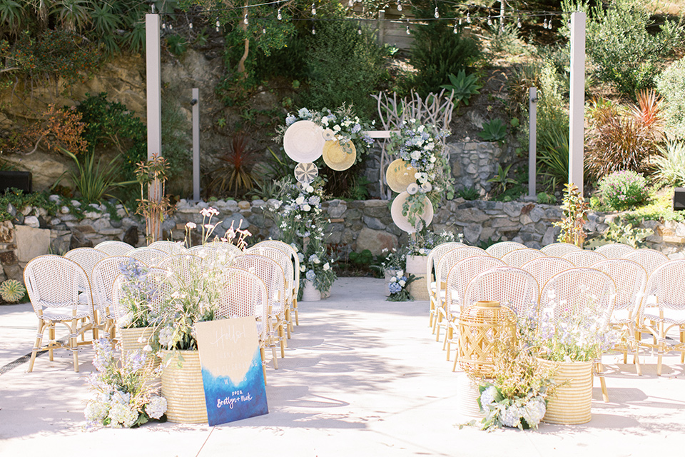  blue beachy wedding with blue and pink décor and the groom in a light blue suit – ceremony space