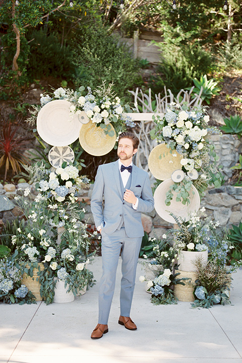  blue beachy wedding with blue and pink décor and the groom in a light blue suit – groom 