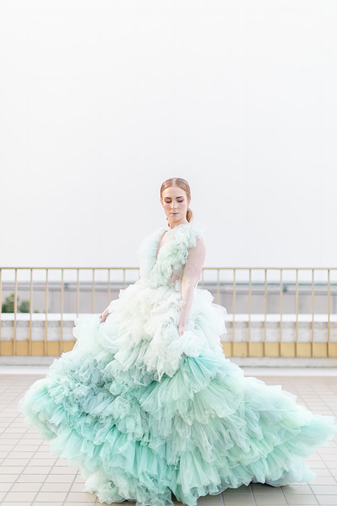  fun wedding at the Westgate hotel and the bride in a blue tulle gown and the groom in a white and black tuxedo - bride 