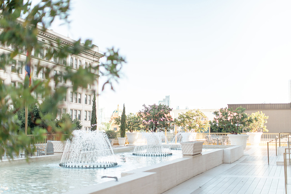  fun wedding at the Westgate hotel and the bride in a blue tulle gown and the groom in a white and black tuxedo – venue 