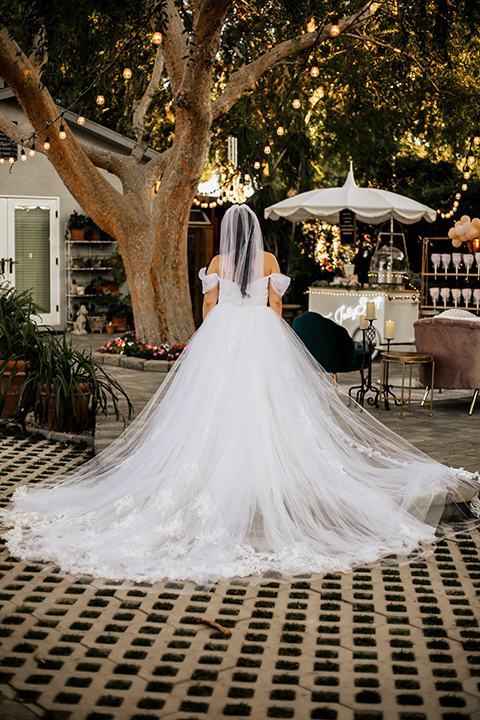  whimsical fairytale wedding with the groom in a gold velvet tuxedo – bride 