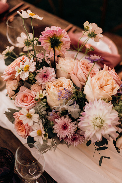  whimsical fairytale wedding with the groom in a gold velvet tuxedo – table florals