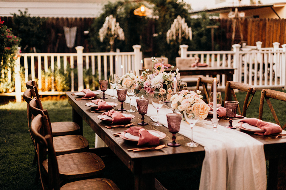  whimsical fairytale wedding with the groom in a gold velvet tuxedo – tables