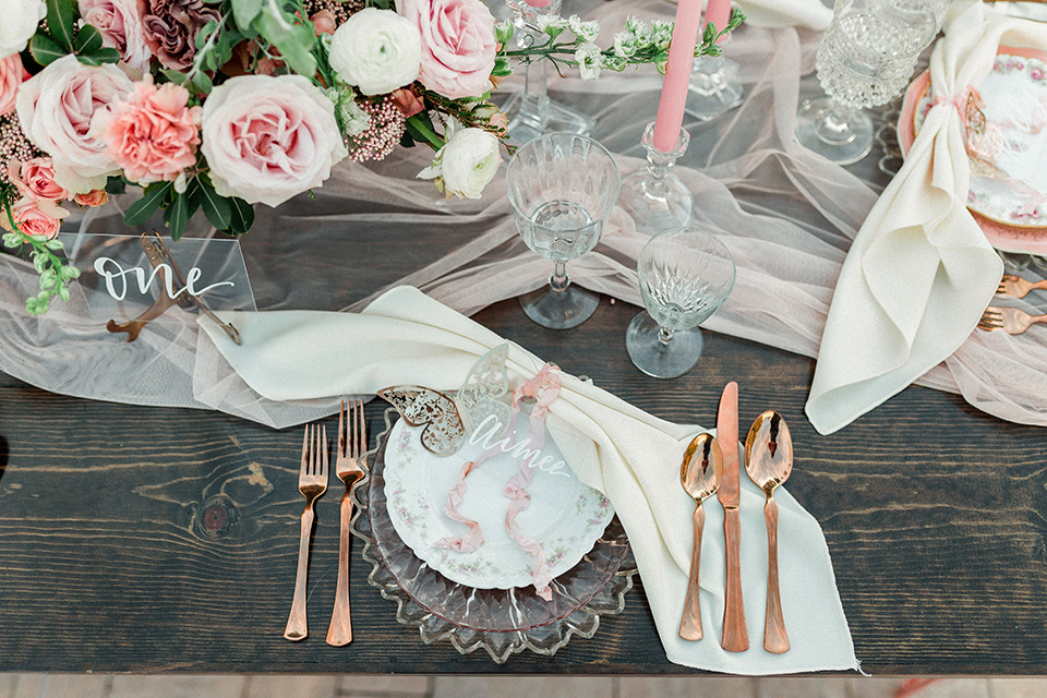  whimsical romance wedding with the bride in a ballgown and the groom in a light grey suit – flatware
