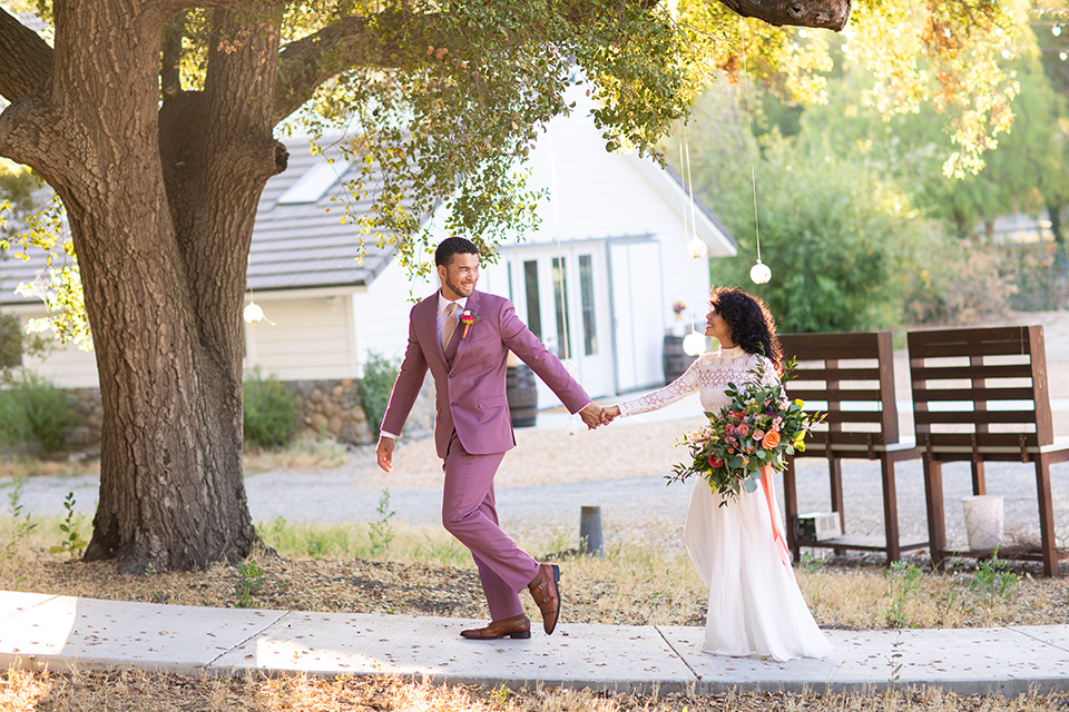  rose pink garden wedding with romantic rustic details – couple running