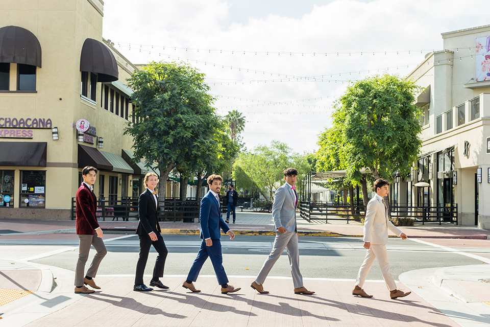  winter formal dance checklist and style tips – group of boys walking across the street like in the abbey road album by the beatles