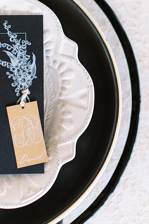  black and white modern wedding at the caramel mountain estate with the bride in a lace gown and the groom in a black velvet tuxedo –  flatware 