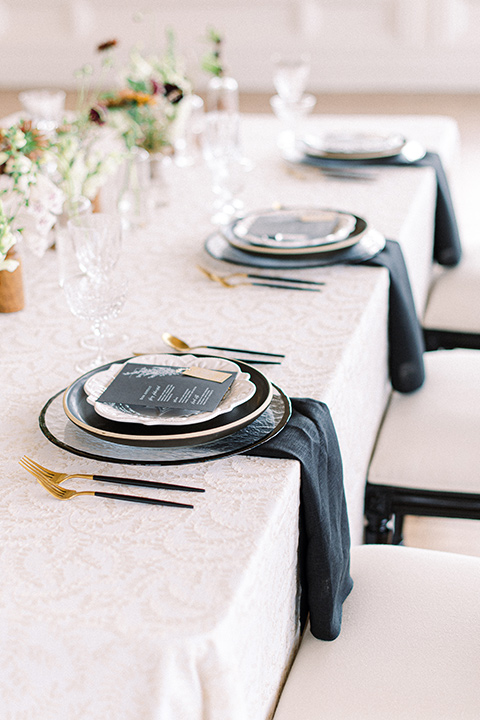  black and white modern wedding at the caramel mountain estate with the bride in a lace gown and the groom in a black velvet tuxedo – flatware 