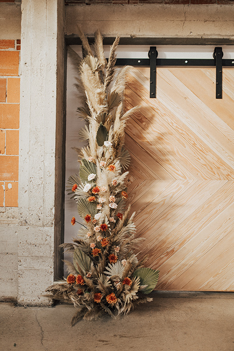  bohemian wedding with neutral colors and the groom in a gold velvet tuxedo – florist 