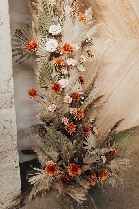  bohemian wedding with neutral colors and the groom in a gold velvet tuxedo – florist 