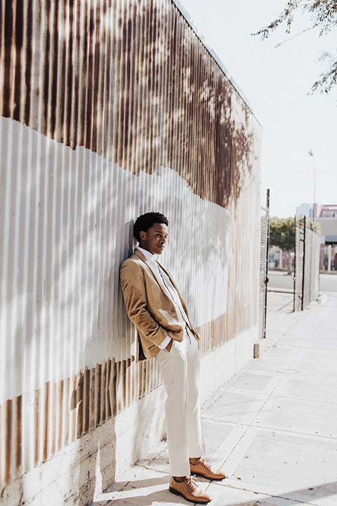  bohemian wedding with neutral colors and the groom in a gold velvet tuxedo – groom 