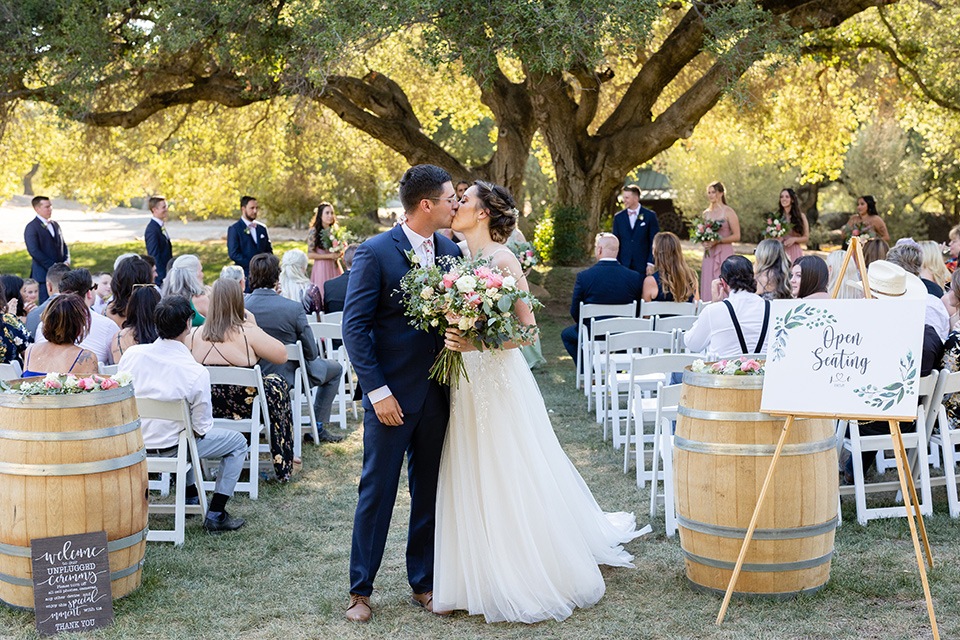  navy and pink garden wedding – kissing down the aisle