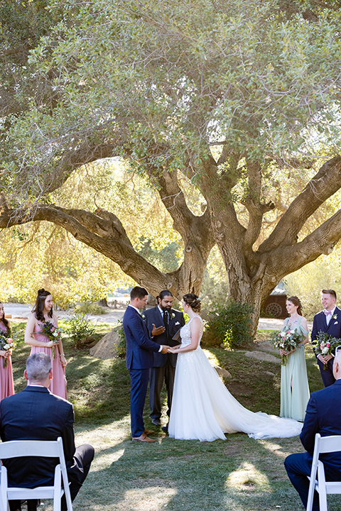  a California wedding with Spanish flare with the bride in a strapless gown and the groom in a gold velvet tux – sunset 