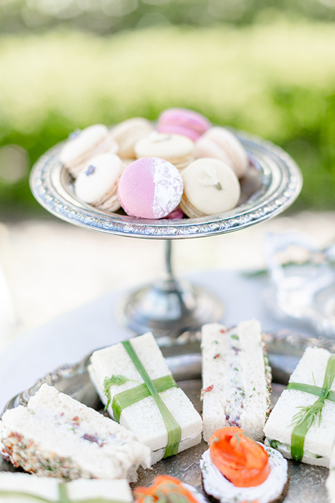  English garden romantic wedding with the bride in an off-the-shoulder gown and the groom in a tan suit – desserts 