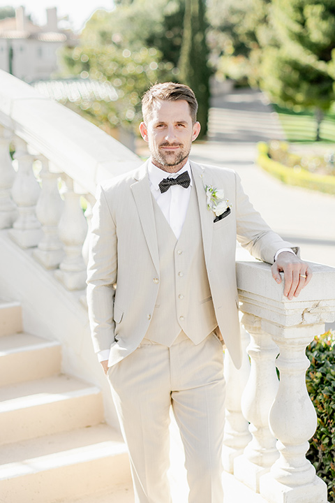  English garden romantic wedding with the bride in an off-the-shoulder gown and the groom in a tan suit – groom 