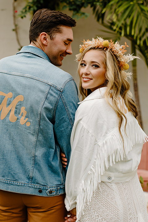  retro boho wedding with amber and brown color scheme – couple with jackets
