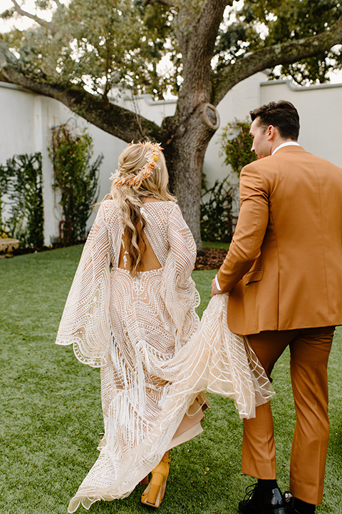  retro boho wedding with amber and brown color scheme – laughing and running 