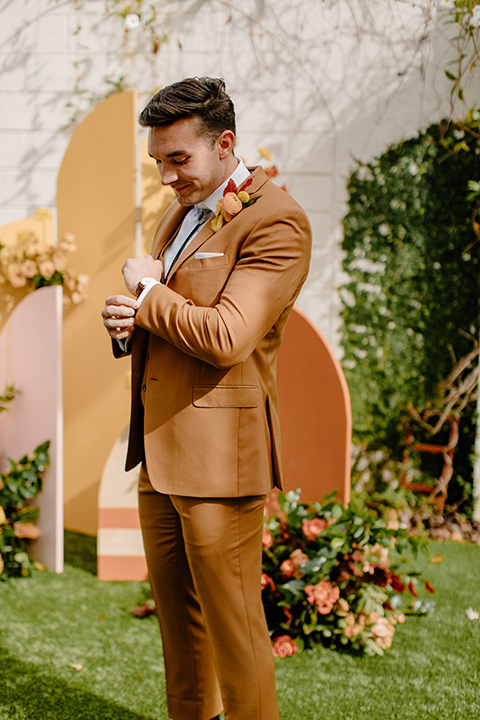  retro boho wedding with amber and brown color scheme – groom