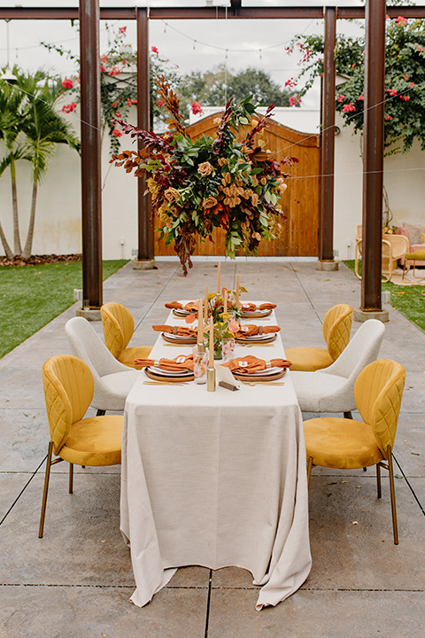  retro boho wedding with amber and brown color scheme – tables