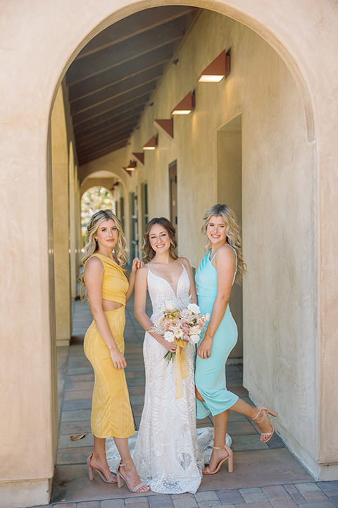  a colorful wedding inspired by the Amalfi Coast with the groom in different wedding day looks – bridesmaids 