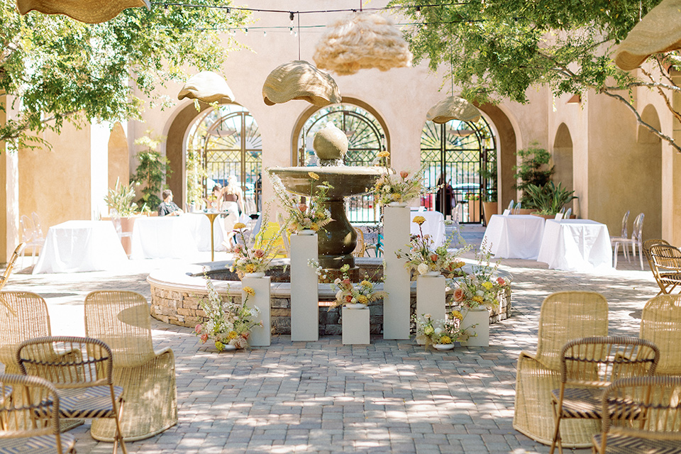  a colorful wedding inspired by the Amalfi Coast with the groom in different wedding day looks – ceremony space 