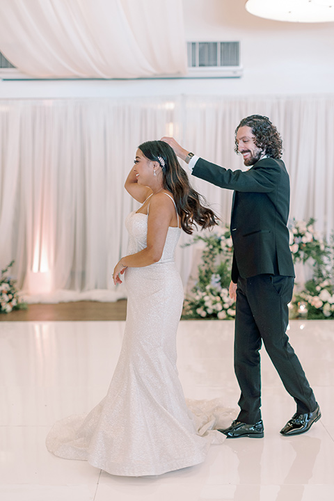  a Bridgerton inspired wedding with grand florals and dainty details – first dance 