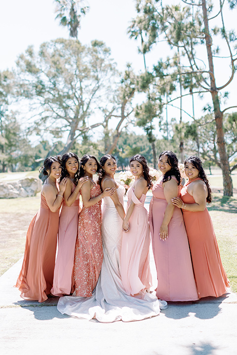  a Bridgerton inspired wedding with grand florals and dainty details - bridesmaids 